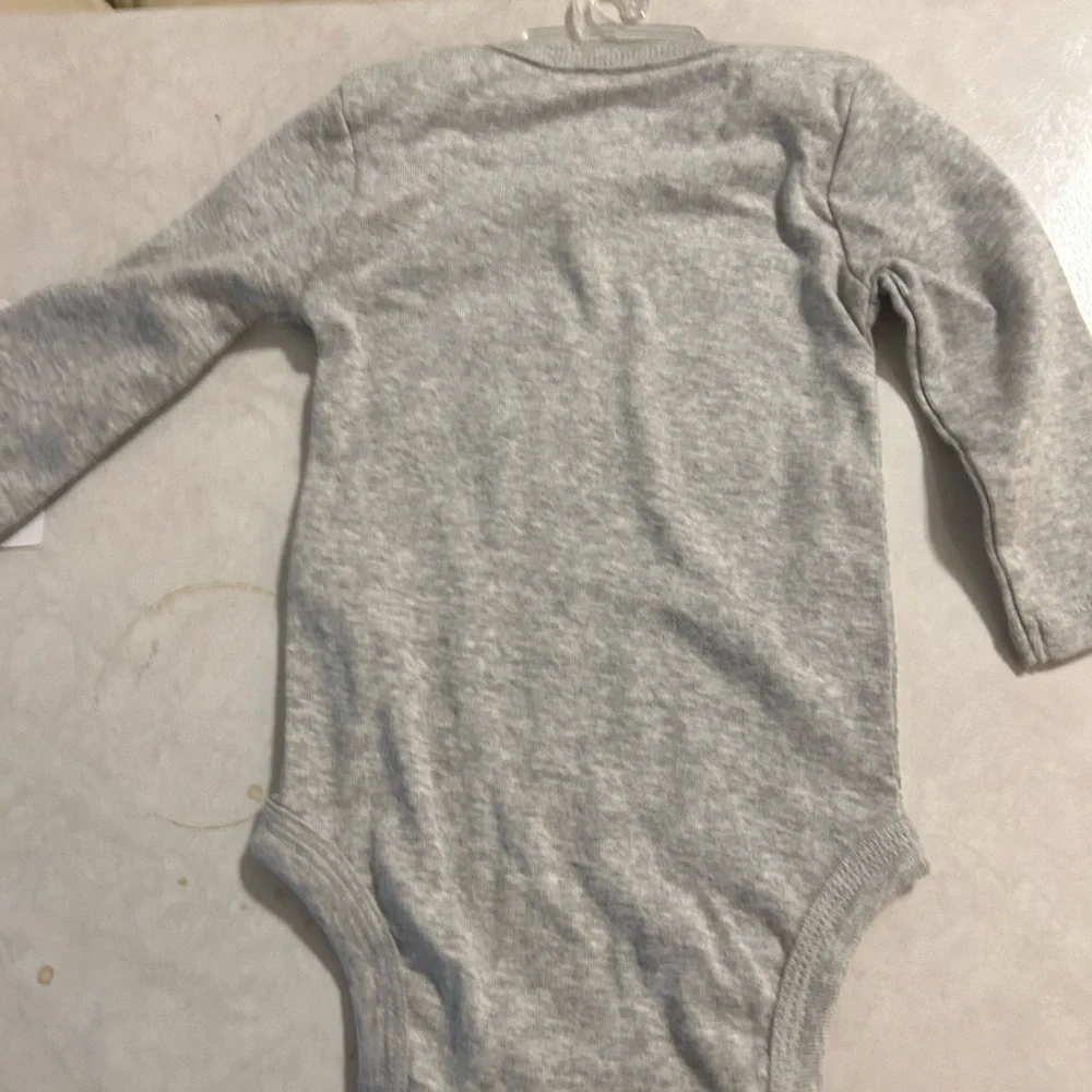 Carter’s just for one Christmas onesie.